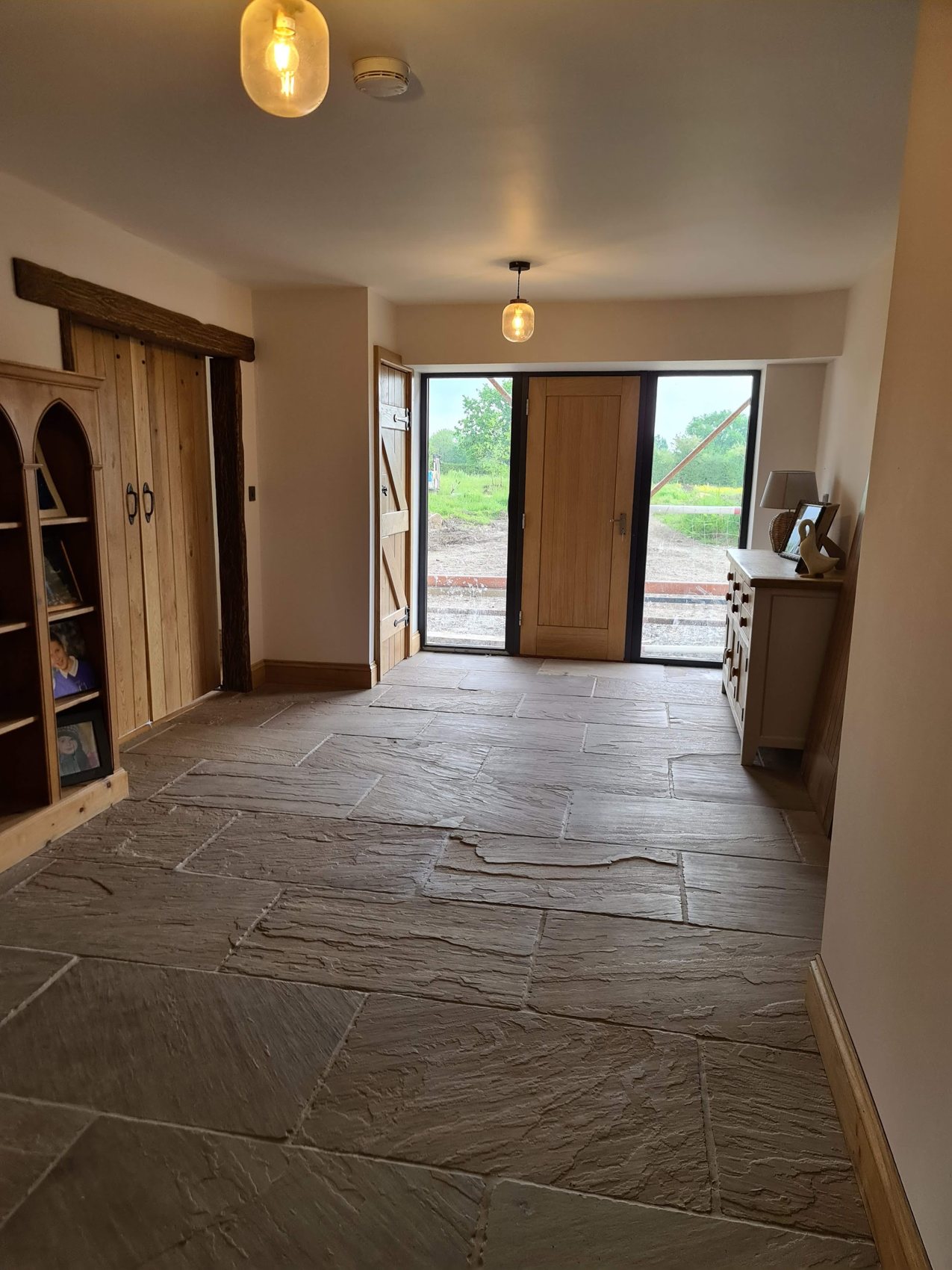 A slate floor running through a hallway
